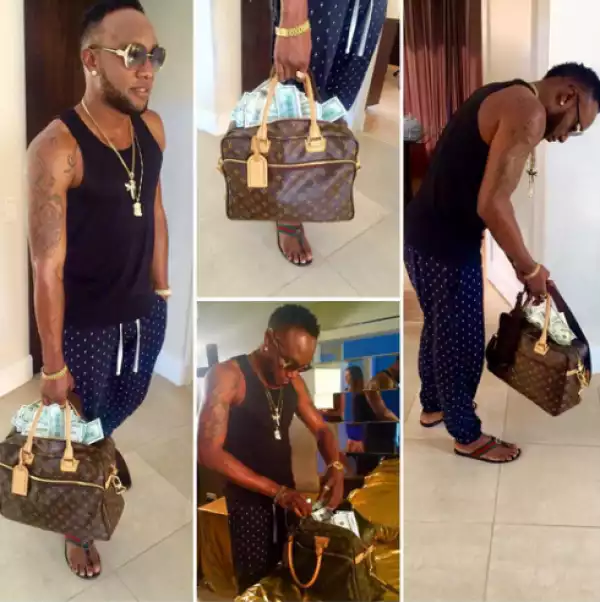 Money In The Bag!! Kcee Shows Off Bag Full Of Dollars [See Photos]